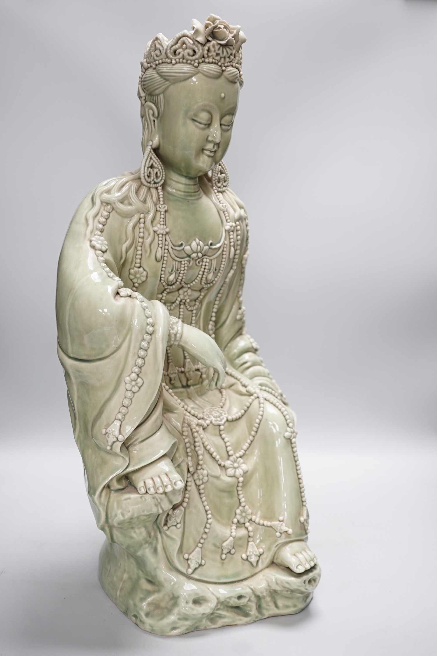 A Chinese celadon glazed empress figure, 55cm